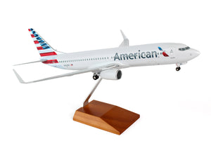 SKR8244 SKYMARKS SUPREME AMERICAN 737-800 1/100 NEW LIVERY W/WOOD STAND&GEAR - SkyMarks Models